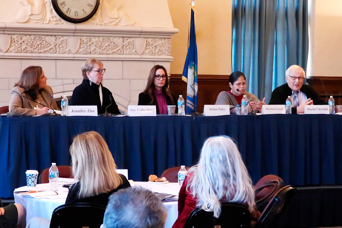 Panelists speak at the mental health symposium in 2023. 