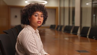 photo of a woman looking at the camera