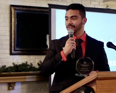 A man accepting an award