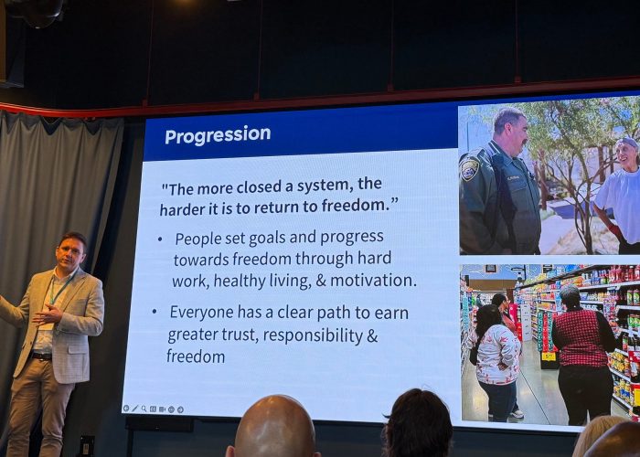a man presenting a slide show