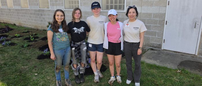 Dr. Park poses with students